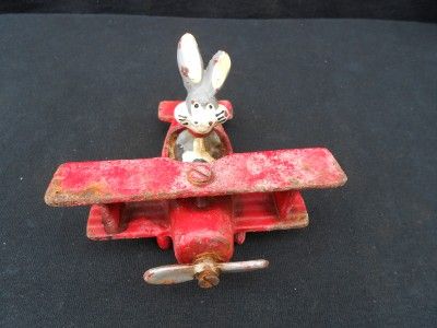 VINTAGE CAST IRON AIRPLANE CARTOON BUGS BUNNY PILOT TOY PLANE  