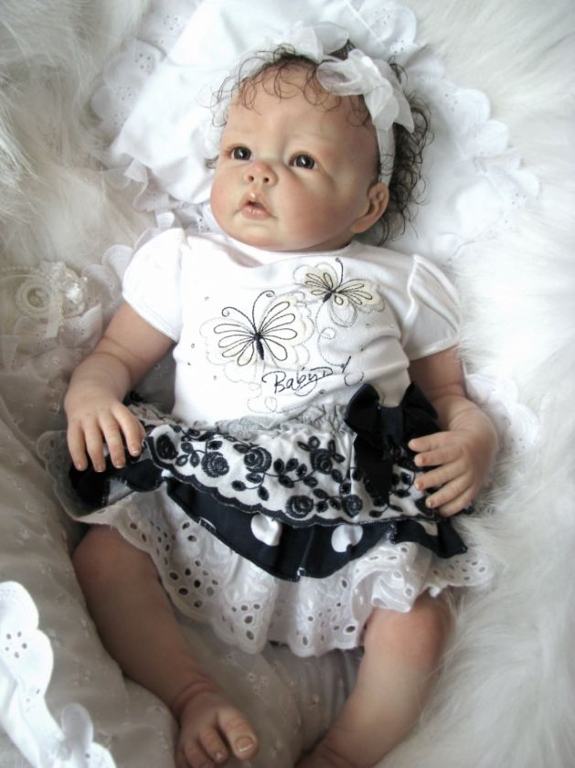 carrisa will bring home with her white bubble romper suit